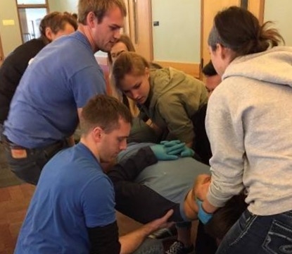 Director David McEvoy teaching a free first aid/CPR course to Home Resources staff